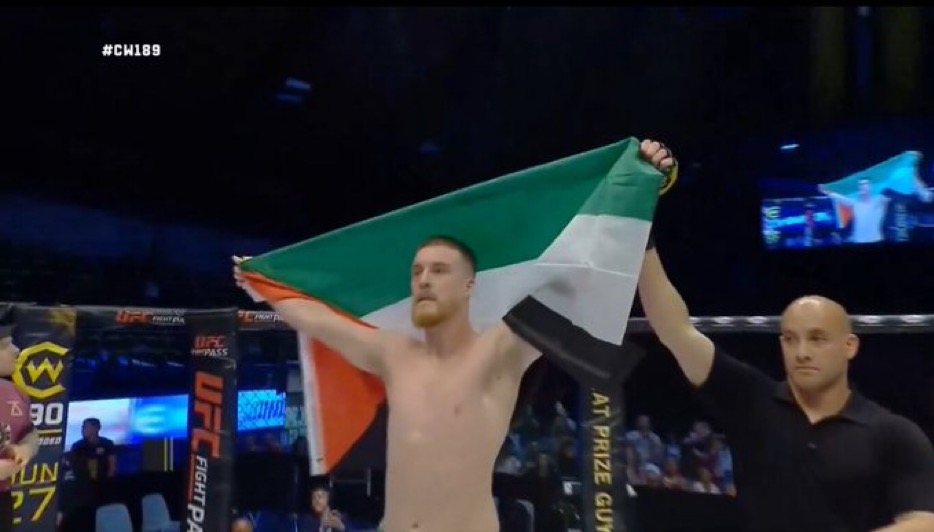 Paddy McCorry Waves Palestinian Flag After Defeating Israeli Opponent